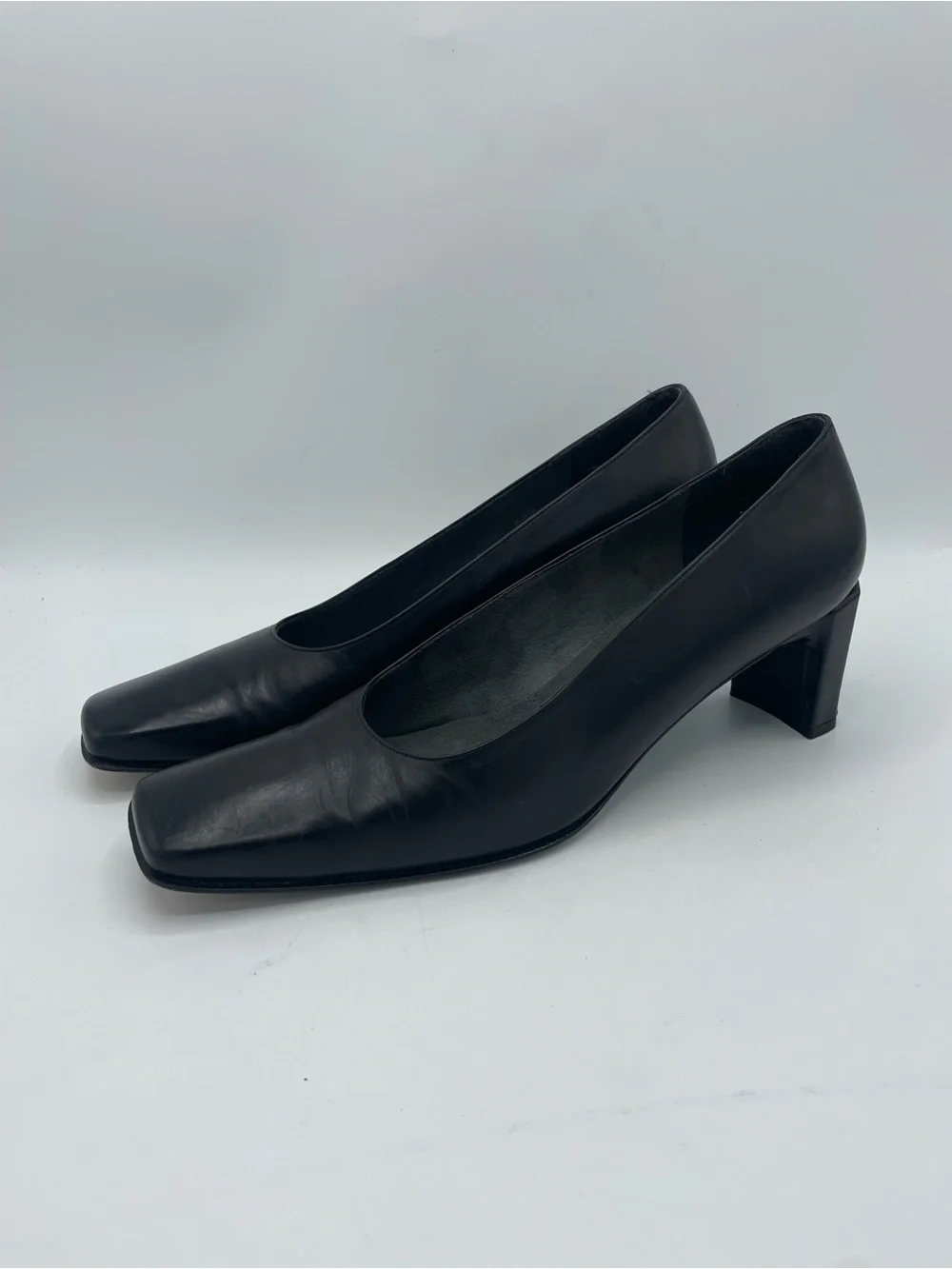 Stuart Weitzman Black Leather Square Toe Chunky Heel Pump.